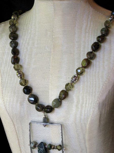 Framed Wire Pendant and Green Garnet Necklace